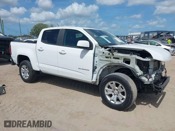 2021 Chevrolet Colorado 2WD LT z VIN 1GCGSCEN8M1159895, wystawiony jako IAAI lot #41946032 z przebiegiem 31 499 mil mil oraz . Historia ofert i sprzedaży dostępna na DreamBid. Obrazek 1.