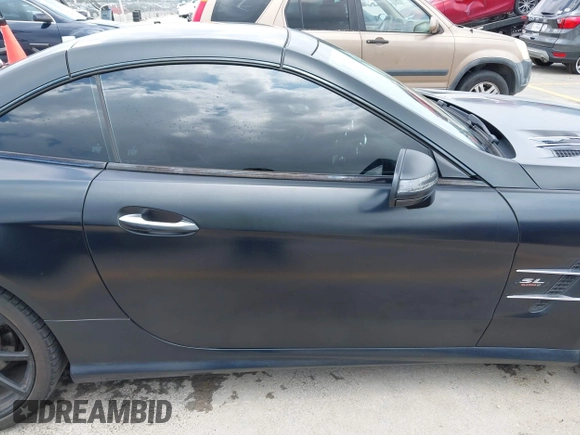 2016 Mercedes-Benz SL 550 z VIN WDDJK7DA1GF040191, wystawiony jako IAAI lot #42441489 z przebiegiem 98 755 mil mil oraz . Historia ofert i sprzedaży dostępna na DreamBid. Obrazek 13.