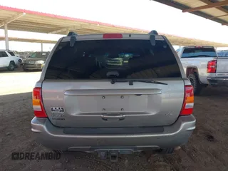 2000 Jeep Grand Cherokee Limited z VIN 1J4GW58N1YC206992, wystawiony jako IAAI lot #42057236 z przebiegiem 183 986 mil mil oraz . Historia ofert i sprzedaży dostępna na DreamBid. Obrazek 16.