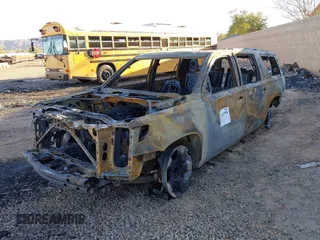 2019 Chevrolet Suburban LT with VIN 1GNSCHKC2KR395939, listed as a IAAI auction lot 41407596 with Not Provided miles and . Bid and sale history available at DreamBid. Image 16.