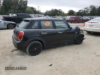 2021 MINI Hardtop 4 Door Oxford Edition with VIN WMWXU7C08M2N64039, listed as a Copart auction lot 83329254 with 31,549 mi miles and Non repairable. Bid and sale history available at DreamBid. Image 3.