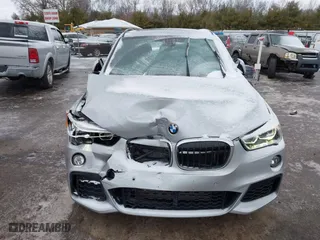 2016 BMW X1 xDrive28i with VIN WBXHT3C3XG5E51358, listed as a IAAI auction lot 41730597 with 90,010 mi miles. Bid and sale history available at carsss.com. Image 12.
