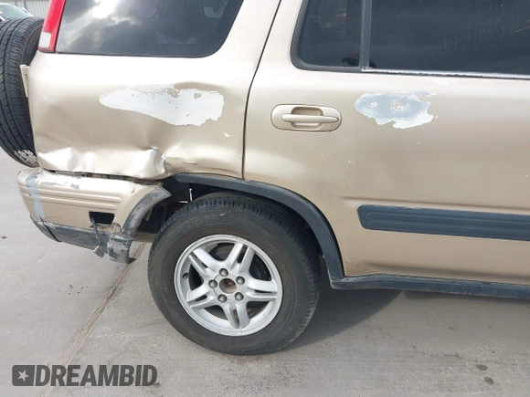 2000 Honda CR-V SE with VIN JHLRD1873YC039813, listed as a IAAI auction lot 40716079 with 214,067 mi miles. Bid and sale history available at carsss.com. Image 20.