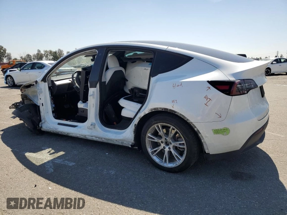 2022 Tesla Model Y Long Range with VIN 7SAYGDEE8NF551850, listed as a Copart auction lot 52747195 with 62,340 mi miles and Salvage Title. Bid and sale history available at carsss.com. Image 2.