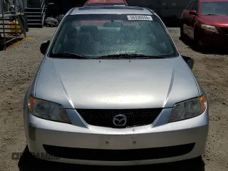2002 Mazda Protege DX z VIN JM1BJ225920543960, wystawiony jako Copart lot #56336555 z przebiegiem 173 874 mil mil oraz Szkoda całkowita • Salvage title. Historia ofert i sprzedaży dostępna na DreamBid. Obrazek 5.