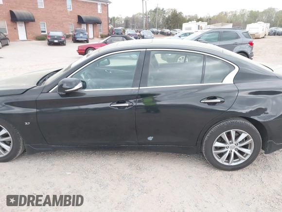 2015 Infiniti Q50 Premium z VIN JN1BV7ARXFM410177, wystawiony jako IAAI lot #41936999 z przebiegiem 129 123 mil mil oraz . Historia ofert i sprzedaży dostępna na DreamBid. Obrazek 14.