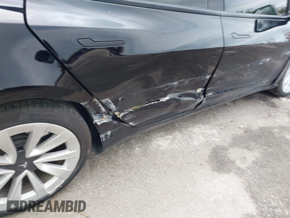 2023 Tesla Model 3 z VIN 5YJ3E1EA4PF433466, wystawiony jako IAAI lot #42249247 z przebiegiem 39 808 mil mil oraz . Historia ofert i sprzedaży dostępna na DreamBid. Obrazek 6.