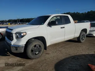 2020 Toyota Tundra SR with VIN 5TFRY5F10LX265784, listed as a Copart auction lot 63809015 with 86,828 mi miles and Salvage title. Bid and sale history available at DreamBid. Image 1.