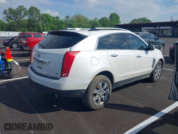 2015 Cadillac SRX Luxury Collection with VIN 3GYFNBE32FS542710, listed as a IAAI auction lot 42132131 with 246,226 mi miles. Bid and sale history available at carsss.com. Image 4.