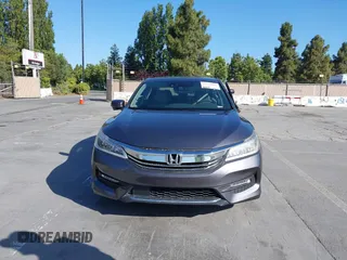 2017 Honda Accord Touring with VIN 1HGCR3F97HA030310, listed as a IAAI auction lot 42539852 with 64,849 mi miles and . Bid and sale history available at DreamBid. Image 12.