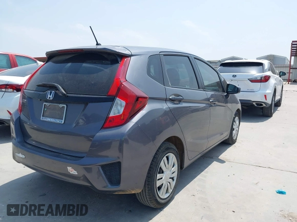2015 Honda Fit LX with VIN 3HGGK5H55FM724750, listed as a IAAI auction lot 42282137 with 32,696 mi miles and . Bid and sale history available at DreamBid. Image 4.