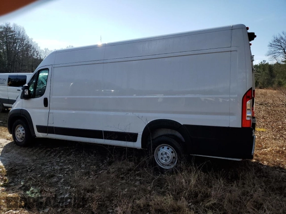 2023 Ram ProMaster Cargo with VIN 3C6MRVJG0PE514388, listed as a Copart auction lot 50252345 with Not Provided miles and Salvage Title. Bid and sale history available at DreamBid. Image 2.