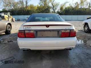 2000 Cadillac Seville Touring STS z VIN 1G6KY5497YU345038, wystawiony jako Copart lot #74315354 z przebiegiem 96 704 mil mil oraz Nie do naprawy • Non repairable. Historia ofert i sprzedaży dostępna na DreamBid. Obrazek 6.