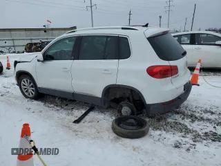 2017 Volkswagen Tiguan Wolfsburg Edition z VIN WVGRV7AX6HW506983, wystawiony jako Copart lot #88631575 z przebiegiem Nie podano mil oraz Szkoda całkowita • Salvage title. Historia ofert i sprzedaży dostępna na DreamBid. Obrazek 2.