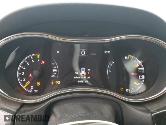 2016 Jeep Grand Cherokee Limited 75th Anniversary with VIN 1C4RJFBGXGC482082, listed as a Copart auction lot 56217165 with 80,787 mi miles and Salvage Title. Bid and sale history available at DreamBid. Image 9.