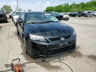 2013 Scion tC z VIN JTKJF5C70D3064576, wystawiony jako Copart lot #56104725 z przebiegiem 83 379 mil mil oraz Szkody całkowita. Historia ofert i sprzedaży dostępna na DreamBid. Obrazek 13.