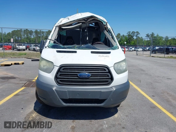 2017 Ford Transit Cargo z VIN 1FTYE1CM2HKB56212, wystawiony jako IAAI lot #42102063 z przebiegiem 174 769 mil mil oraz . Historia ofert i sprzedaży dostępna na DreamBid. Obrazek 12.