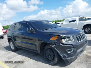 2014 Jeep Grand Cherokee Laredo with VIN 1C4RJEAG0EC179563, listed as a IAAI auction lot 39799427 with 209,169 mi miles and . Bid and sale history available at DreamBid. Image 6.