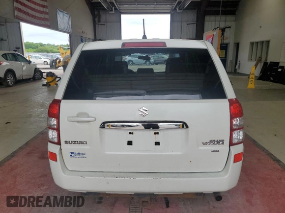 2013 Suzuki Grand Vitara Premium with VIN JS3TD0D64D4100568, listed as a Copart auction lot 63958985 with 140,668 mi miles and Salvage title. Bid and sale history available at DreamBid. Image 6.