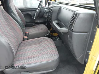 2000 Jeep Wrangler SE with VIN 1J4FA29P2YP797156, listed as a IAAI auction lot 41517183 with 114,236 mi miles. Bid and sale history available at carsss.com. Image 5.