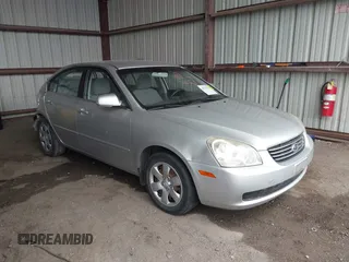 2008 Kia Optima LX z VIN KNAGE123385267495, wystawiony jako IAAI lot #42579050 z przebiegiem 83 164 mil mil oraz . Historia ofert i sprzedaży dostępna na DreamBid. Obrazek 1.