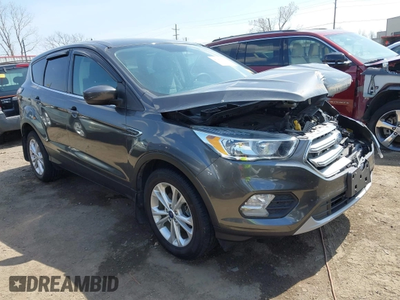 2017 Ford Escape SE z VIN 1FMCU0GD9HUD28110, wystawiony jako IAAI lot #41903505 z przebiegiem 66 808 mil mil oraz . Historia ofert i sprzedaży dostępna na DreamBid. Obrazek 1.