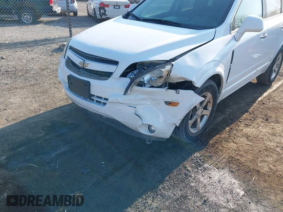2014 Chevrolet Captiva Sport LT z VIN 3GNAL3EK8ES557432, wystawiony jako IAAI lot #42018256 z przebiegiem 92 569 mil mil oraz . Historia ofert i sprzedaży dostępna na DreamBid. Obrazek 6.