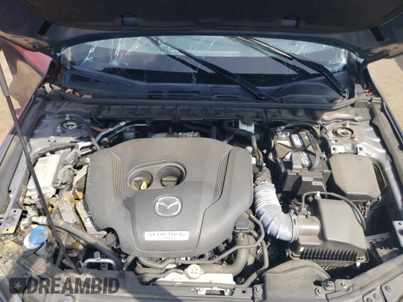 2021 Mazda 3 Premium Plus z VIN JM1BPBNY7M1311309, wystawiony jako Copart lot #54044315 z przebiegiem 59 642 mil mil oraz Szkoda całkowita • Salvage title. Historia ofert i sprzedaży dostępna na DreamBid. Obrazek 11.