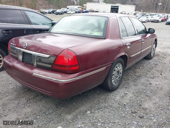 2006 Mercury Grand Marquis GS with VIN 2MEFM74W76X601761, listed as a IAAI auction lot 41627610 with 139,140 mi miles. Bid and sale history available at carsss.com. Image 4.