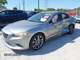 2014 Mazda 6 i Grand Touring с VIN JM1GJ1W6XE1159641, выставлен на аукционе IAAI как лот 39305628 с пробегом 107 853 миль миль и . История ставок и продаж доступна на DreamBid. Изображение 2.