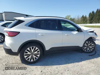 2020 Ford Escape Titanium Hybrid z VIN 1FMCU9DZ4LUC12763, wystawiony jako Copart lot #56589615 z przebiegiem Nie podano mil oraz Szkoda całkowita • Salvage title. Historia ofert i sprzedaży dostępna na DreamBid. Obrazek 3.