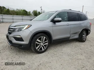 2017 Honda Pilot Touring z VIN 5FNYF6H92HB006855, wystawiony jako Copart lot #53650655 z przebiegiem 130 732 mil mil oraz Szkoda całkowita • Salvage title. Historia ofert i sprzedaży dostępna na DreamBid. Obrazek 1.