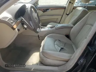 2003 Mercedes-Benz E-Class 3.2L with VIN WDBUF65JX3A313638, listed as a Copart auction lot 70869194 with 142,524 mi miles and Salvage Title. Bid and sale history available at carsss.com. Image 7.