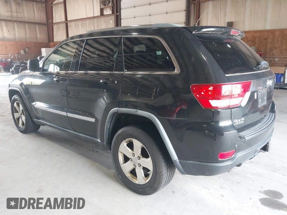 2012 Jeep Grand Cherokee Laredo with VIN 1C4RJFAT8CC182128, listed as a IAAI auction lot 40154044 with 239,601 mi miles. Bid and sale history available at carsss.com. Image 3.