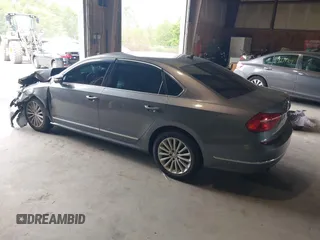 2016 Volkswagen Passat 1.8T SE with VIN 1VWBT7A35GC011129, listed as a IAAI auction lot 39977788 with 123,007 mi miles. Bid and sale history available at carsss.com. Image 3.