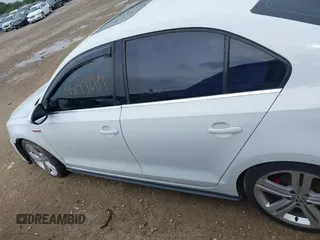 2017 Volkswagen Jetta GLI z VIN 3VW4T7AJ8HM349440, wystawiony jako IAAI lot #42491919 z przebiegiem 141 764 mil mil oraz . Historia ofert i sprzedaży dostępna na DreamBid. Obrazek 15.