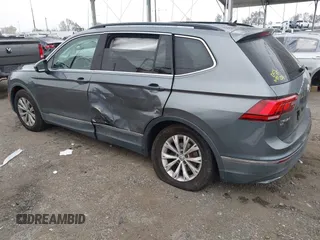 2018 Volkswagen Tiguan SEL z VIN 3VV3B7AX4JM005780, wystawiony jako IAAI lot #41880005 z przebiegiem 149 578 mil mil oraz . Historia ofert i sprzedaży dostępna na DreamBid. Obrazek 3.