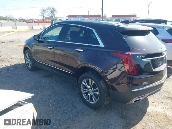 2021 Cadillac XT5 FWD Premium Luxury with VIN 1GYKNCRSXMZ118990, listed as a IAAI auction lot 41991857 with 92,085 mi miles and . Bid and sale history available at DreamBid. Image 3.