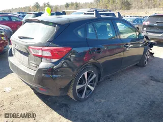 2017 Subaru Impreza Sport with VIN 4S3GTAK61H1714772, listed as a IAAI auction lot 41680257 with 144,027 mi miles. Bid and sale history available at carsss.com. Image 4.