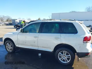 2008 Volkswagen Touareg V6 with VIN WVGBE77L48D033523, listed as a IAAI auction lot 41076281 with 202,286 mi miles and . Bid and sale history available at DreamBid. Image 14.