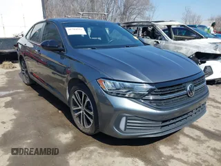2022 Volkswagen Jetta Sport with VIN 3VWBM7BU6NM017084, listed as a IAAI auction lot 41784555 with 60,364 mi miles and . Bid and sale history available at DreamBid. Image 1.