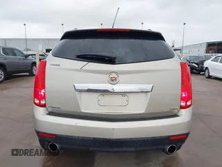 2015 Cadillac SRX z VIN 3GYFNAE37FS597695, wystawiony jako IAAI lot #42184666 z przebiegiem 106 210 mil mil oraz . Historia ofert i sprzedaży dostępna na DreamBid. Obrazek 16.