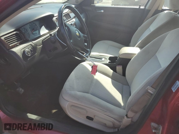 2014 Chevrolet Impala LT with VIN 2G1WB5E30E1147475, listed as a Copart auction lot 53700655 with 134,661 mi miles and Salvage title. Bid and sale history available at DreamBid. Image 7.