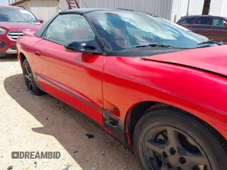 2000 Pontiac Firebird Firebird with VIN 2G2FS22KXY2158942, listed as a IAAI auction lot 42668388 with Not provided miles and . Bid and sale history available at DreamBid. Image 6.