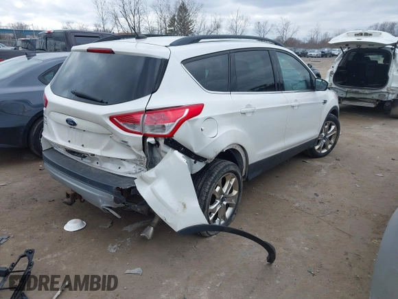 2016 Ford Escape SE with VIN 1FMCU9G94GUB55448, listed as a IAAI auction lot 41854864 with 153,457 mi miles. Bid and sale history available at carsss.com. Image 4.