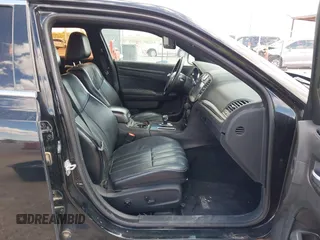 2014 Chrysler 300 S with VIN 2C3CCABG5EH205020, listed as a IAAI auction lot 42247180 with 186,458 mi miles and . Bid and sale history available at DreamBid. Image 5.
