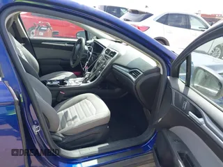 2016 Ford Fusion S z VIN 3FA6P0G7XGR263248, wystawiony jako IAAI lot #42020410 z przebiegiem 167 430 mil mil oraz . Historia ofert i sprzedaży dostępna na DreamBid. Obrazek 5.