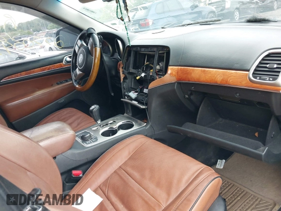 2011 Jeep Grand Cherokee Overland with VIN 1J4RR6GG9BC635930, listed as a IAAI auction lot 42267446 with Not provided miles and . Bid and sale history available at DreamBid. Image 5.