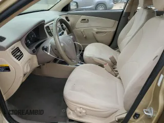 2009 Kia Rio LX with VIN KNADE223496549097, listed as a Copart auction lot 54375975 with 140,882 mi miles and Salvage Title. Bid and sale history available at DreamBid. Image 7.