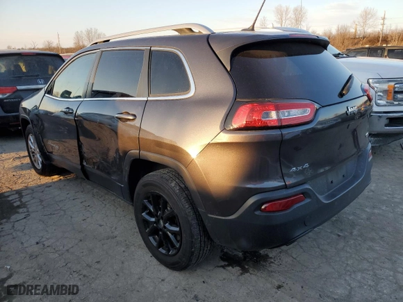 2015 Jeep Cherokee Latitude with VIN 1C4PJMCB2FW764115, listed as a Copart auction lot 41834455 with 124,856 mi miles and Salvage Title. Bid and sale history available at carsss.com. Image 2.